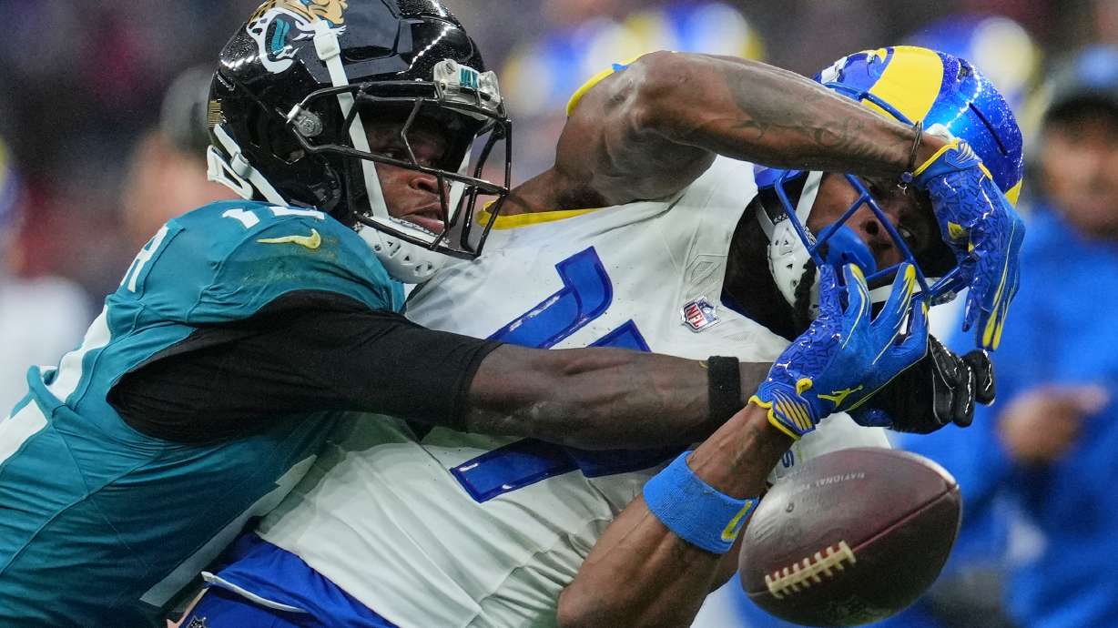 FILE - Los Angeles Rams wide receiver Davante Adams (17) is challenged by Jacksonville Jaguars wide receiver Travis Hunter (12) during the second half of an NFL football game between the Los Angeles Rams and the Jacksonville Jaguars in London, Sunday, Oct. 19, 2025.