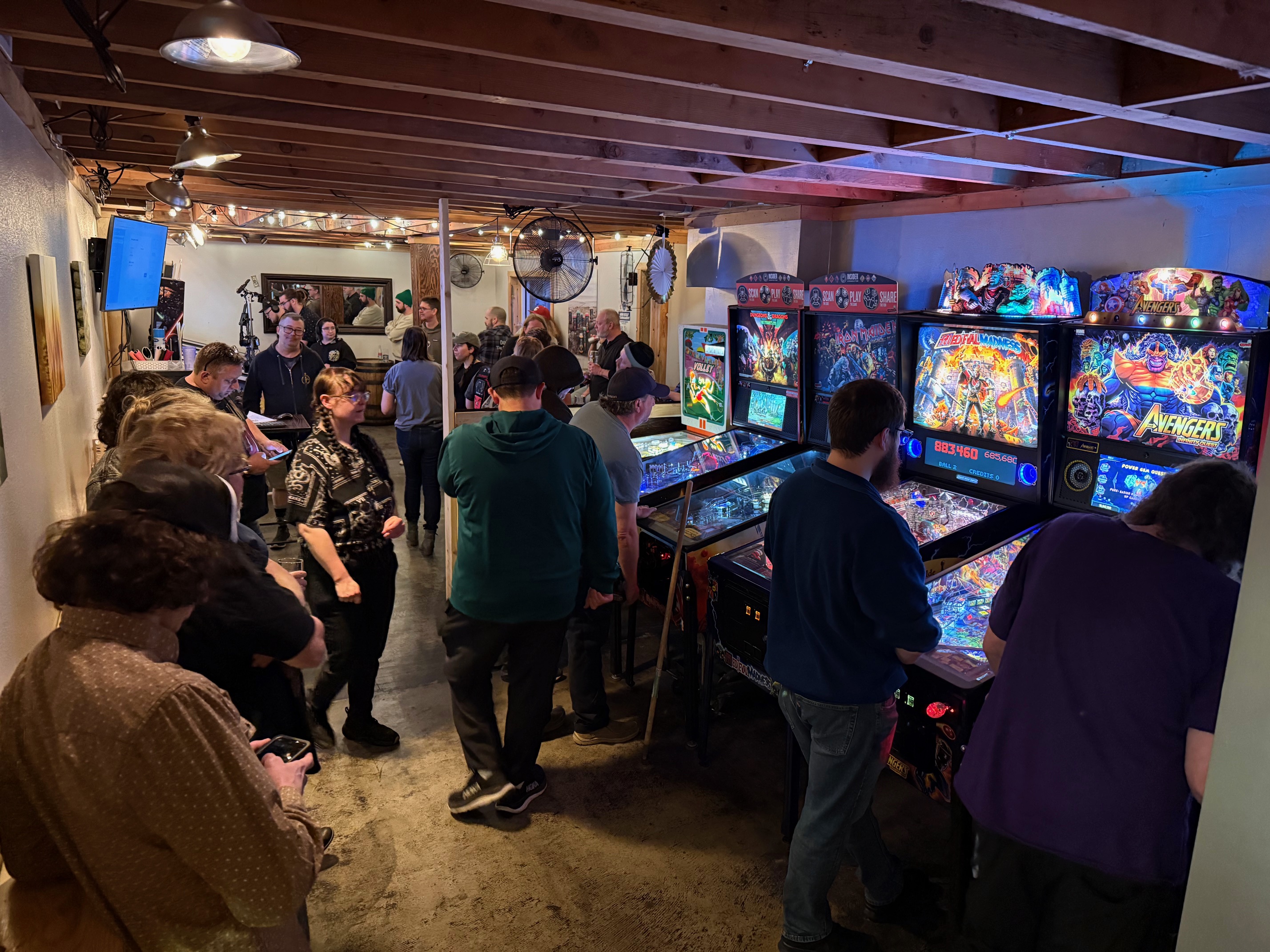 Pinball players compete in a tournament at Kiitos Brewing, 608 W. 700 South, on Tuesday.