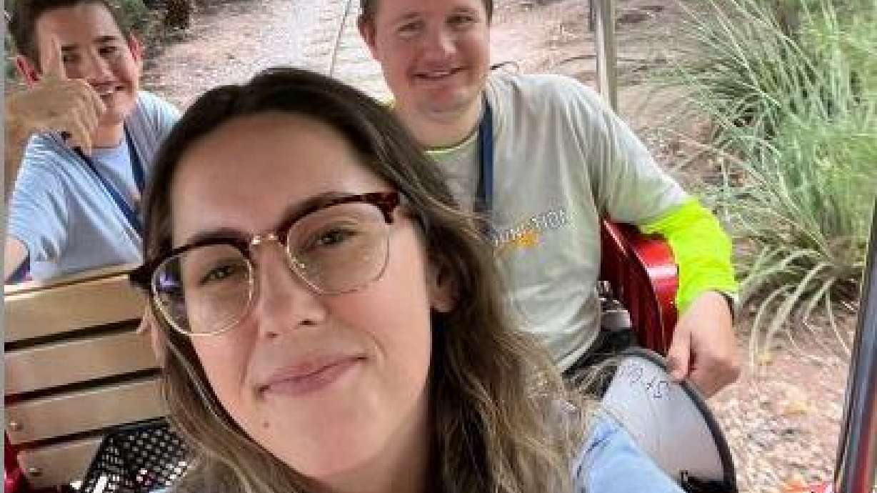 Hannah Keller pictured with Cameron Peterson (right) and Austin (left) at the Thunder Junction All Abilities Park in St. George. The park has 55 employees of all ability levels.