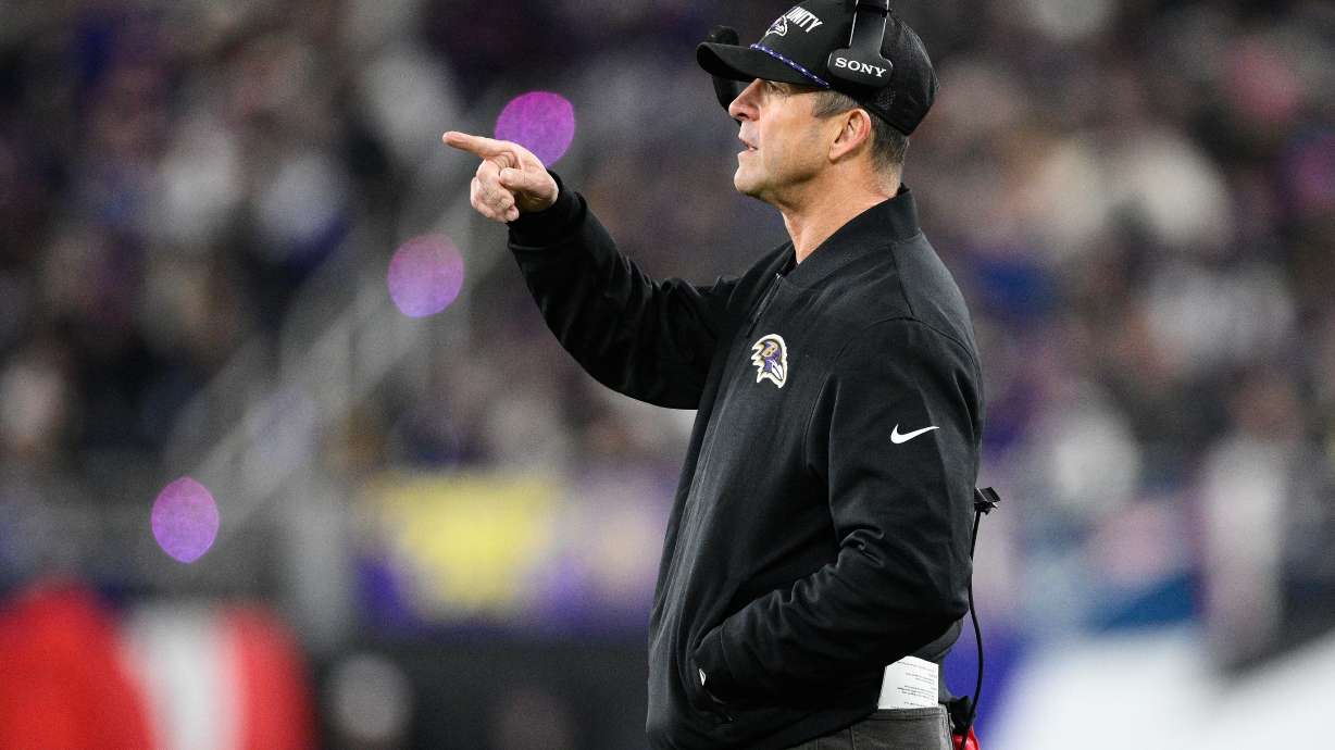 Baltimore Ravens head coach John Harbaugh gestures during the first half of an NFL football game against the New England Patriots, Sunday, Dec. 21, 2025, in Baltimore.