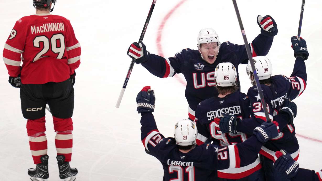 FILE - United States' Jake Sanderson (85) is congratulated after his goal against Canada during the second period of the 4 Nations Face-Off championship hockey game, Thursday, Feb. 20, 2025, in Boston.