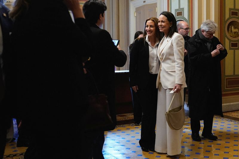 Venezuelan opposition leader Maria Corina Machado poses for a picture as she arrives at the Capitol to meet senators in Washington, Thursday. Machado has generally found more enthusiastic allies in Congress.