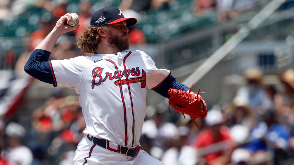 FILE - Atlanta Braves pitcher Pierce Johnson throws during the eighth inning of a baseball game against the Baltimore Orioles, July 6, 2025, in Atlanta.
