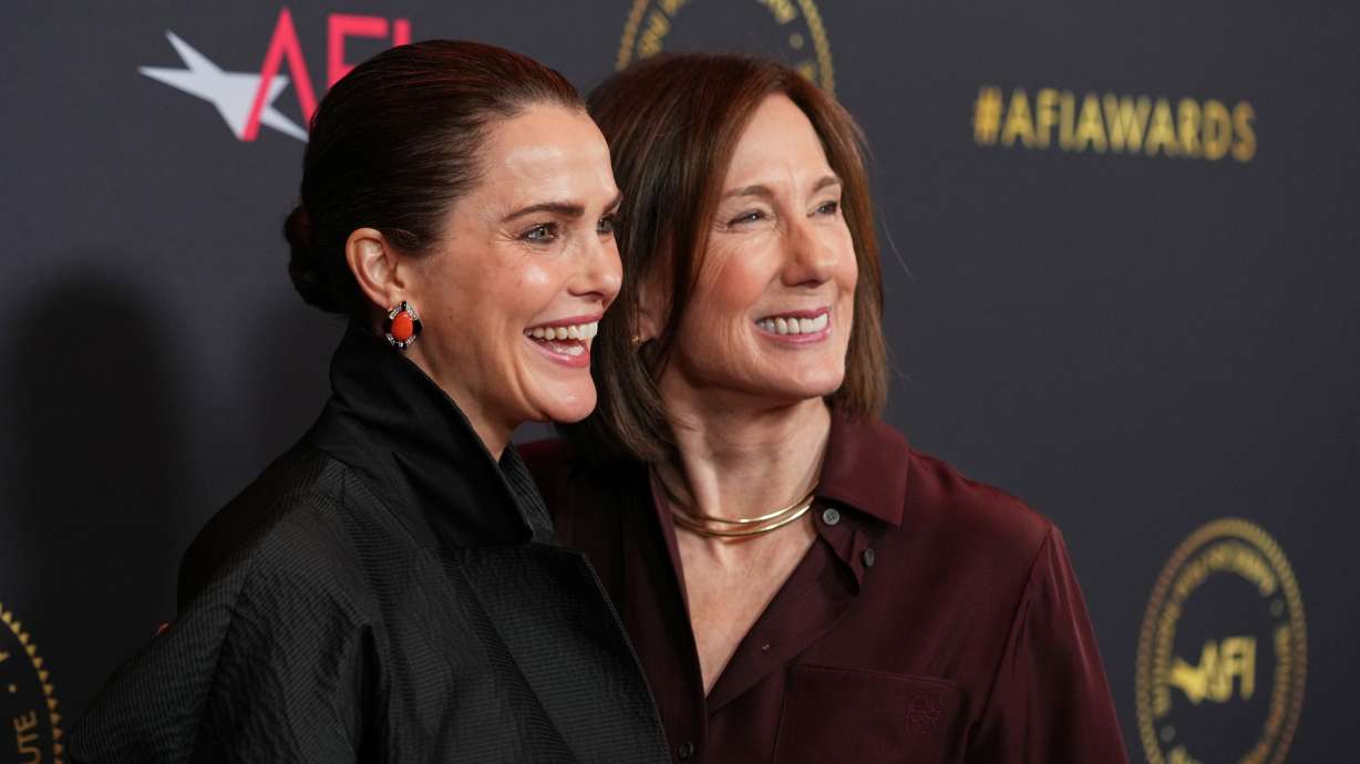 Actor Keri Russell, left, and producer Kathleen Kennedy pose together at the AFI Awards at the Four Seasons in Los Angeles, Friday. Kennedy announced on Thursday she was stepping down from Lucasfilm.