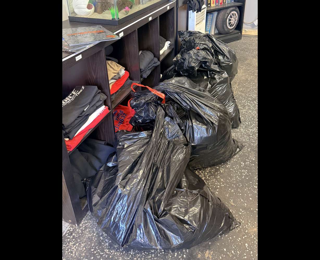 Bags of donated clothes inside Choice Tires in Grantsville on Thursday. A group of local businesses in Tooele County are coming together to hold a winter clothing drive on Jan. 31.