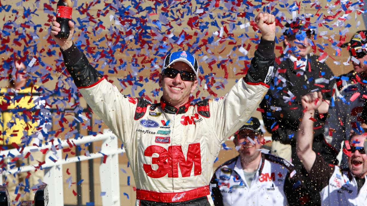FILE - Greg Biffle celebrates in victory lane after winning the NASCAR Sprint Cup Series auto race at Kansas Speedway on Sunday, Oct. 3, 2010, in Kansas City, Kan.