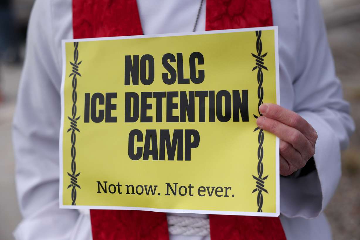 Faith leaders joined around 100 protesters outside a potential future Immigration and Customs Enforcement immigrant detention center in Salt Lake City on Friday.