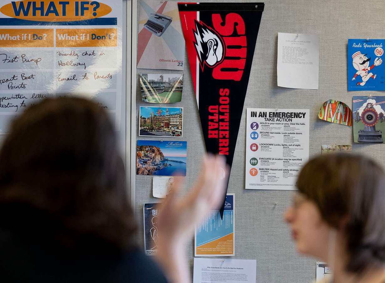 A Southern Utah University pennant hangs in a concurrent enrollment English class at Jordan High School in Sandy on Thursday. Concurrent enrollment numbers are at record highs, according to the Utah State Board of Education.