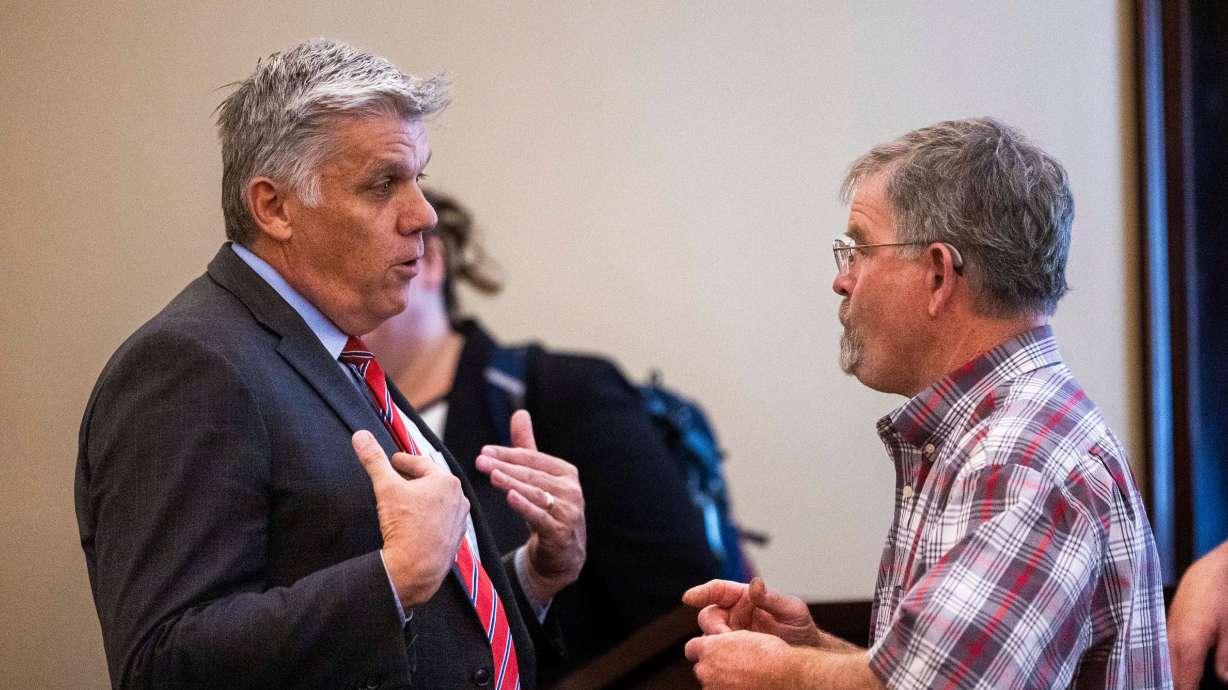 Phil Lyman speaks with Fred Hayes before a press conference announcing Lyman's lawsuit to require Utah Lt. Gov. Deidre Henderson to provide a copy of the Statewide Voter Registration List, in Salt Lake City on June 6. The lawsuit was rejected.