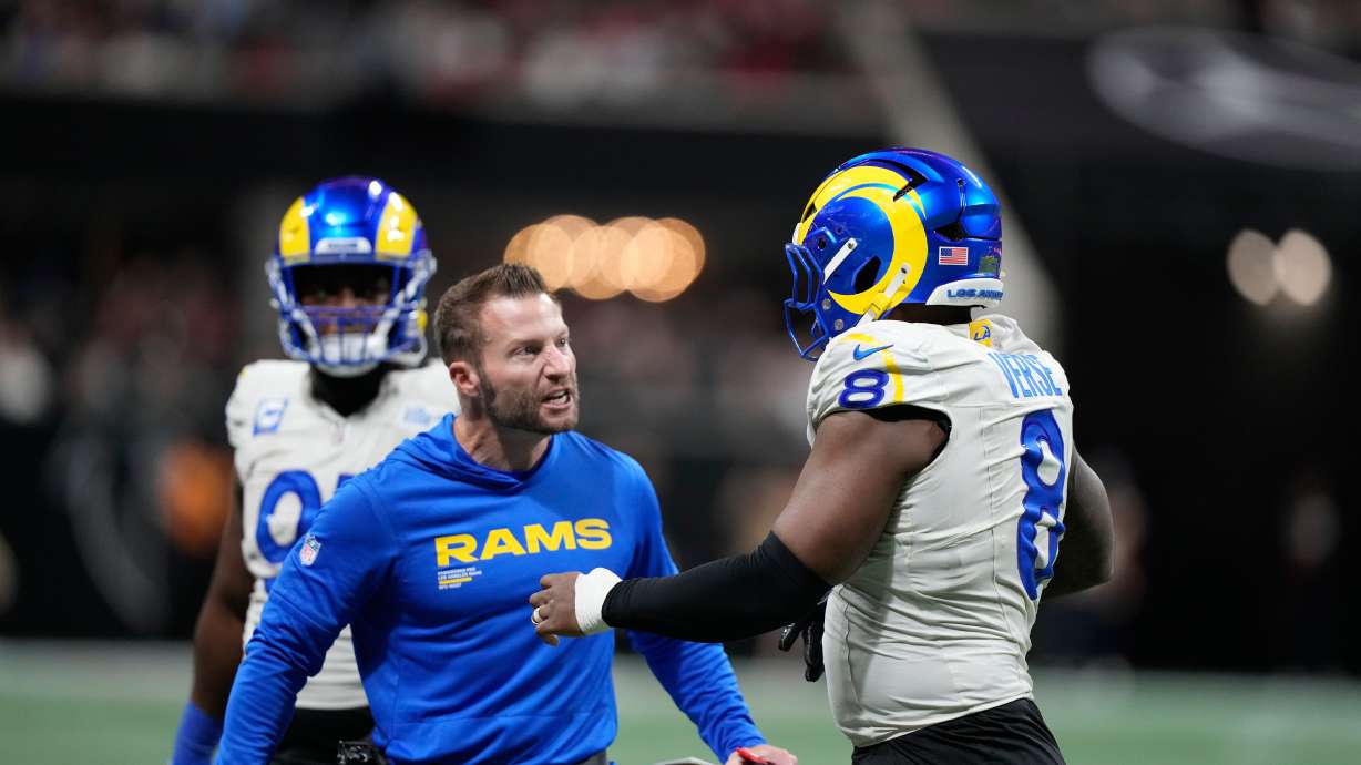 Los Angeles Rams head coach Sean McVay congratulates linebacker Jared Verse (8) after he blocked a field goal attempt and returned it for a touchdown in the second half of an NFL football game against the Atlanta Falcons, Monday, Dec. 29, 2025, in Atlanta.