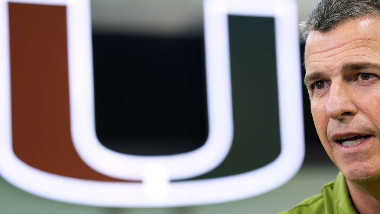 Miami football head coach Mario Cristobal speaks during an interview on the team's indoor practice field in Coral Gables, Fla., Monday, Jan. 12, 2026.