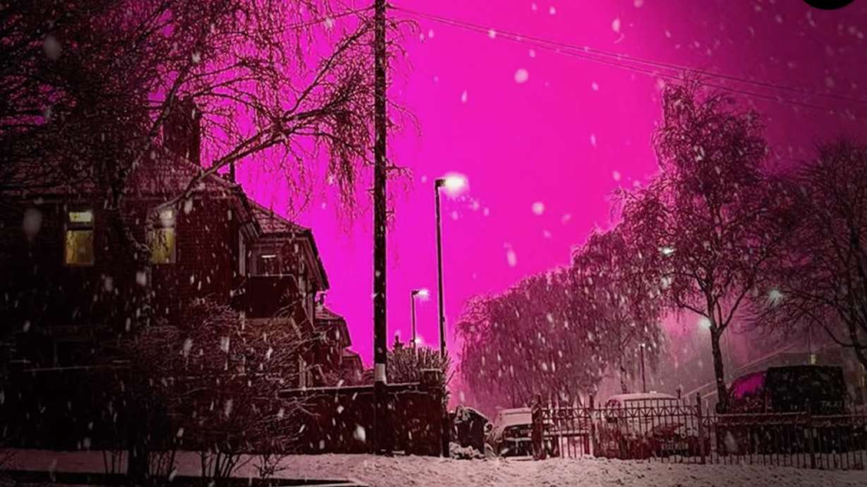 The skies turned a bright pink over Birmingham, England, on Jan. 9, thanks to lighting used to keep the grass on a soccer field healthy and foggy, overcast weather.