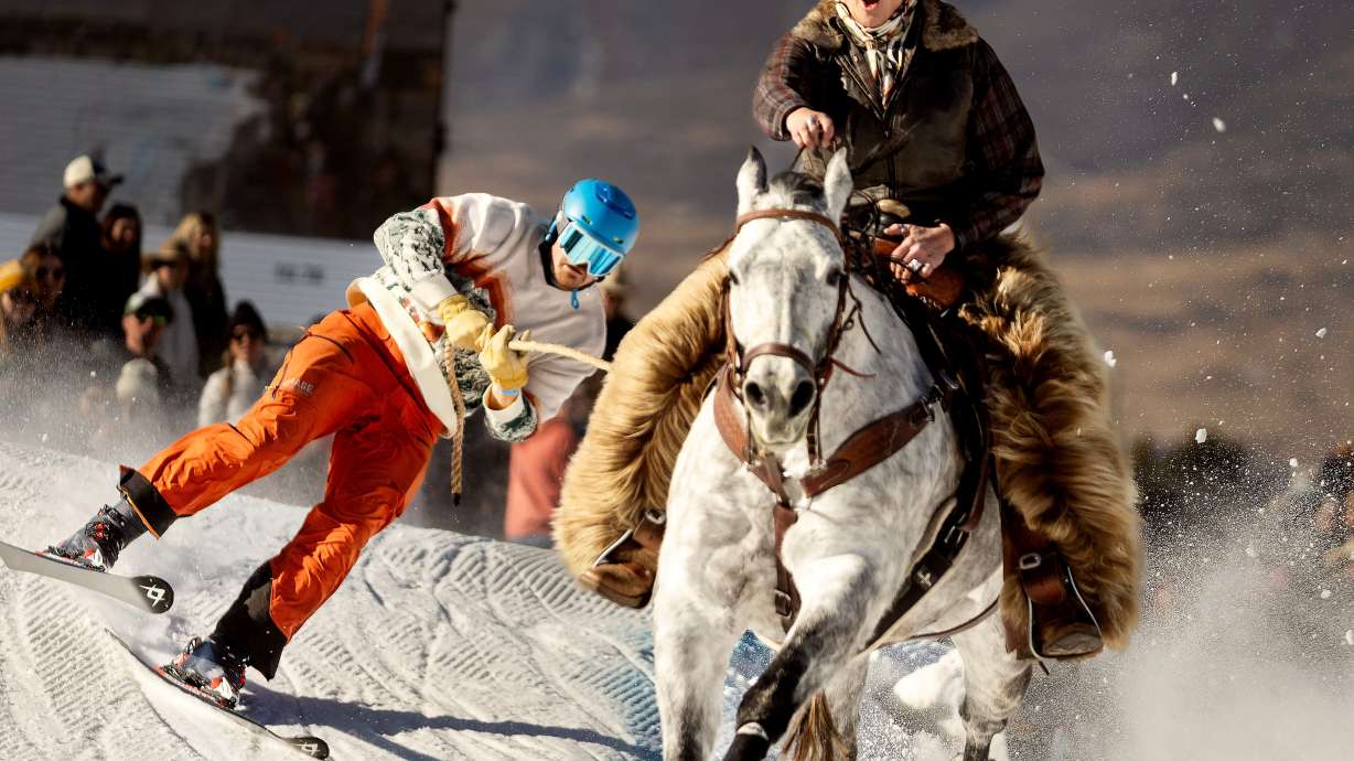 Leanna Francis pulls Nicholas Vornle of Salt Lake City in the Pro Skijor Frontier Tour at the Wasatch Event Center in Heber City on Friday.