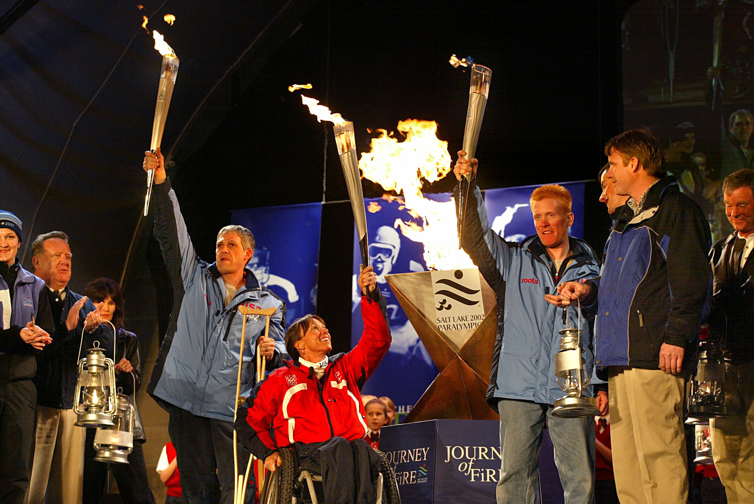 Paralympic athletes Andy Parr, Candace Cable and Dan Henderson light the cauldron at Washington Square, March 6, 2002. Former House Speaker Brad Wilson said he envisions a "new level" for the Paralympics in Utah in 2034.