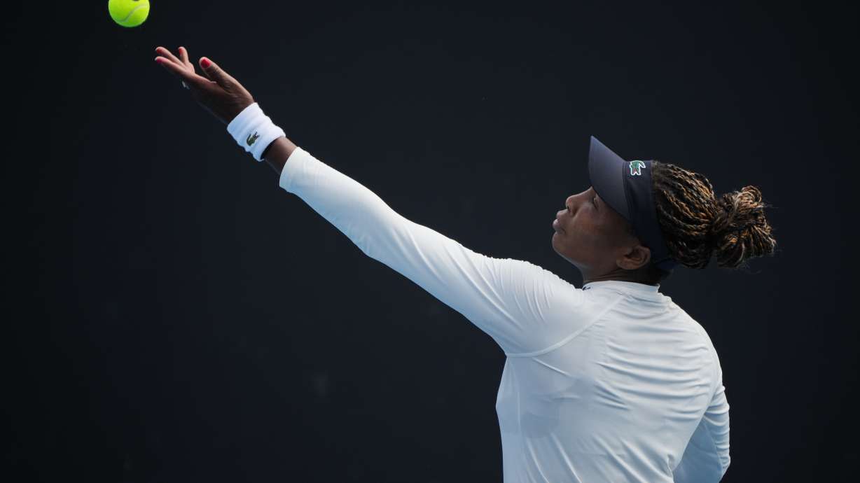 Venus Williams of the United States serves during a practice session ahead of the Australian Open tennis championship in Melbourne, Australia, Friday, Jan. 16, 2026.
