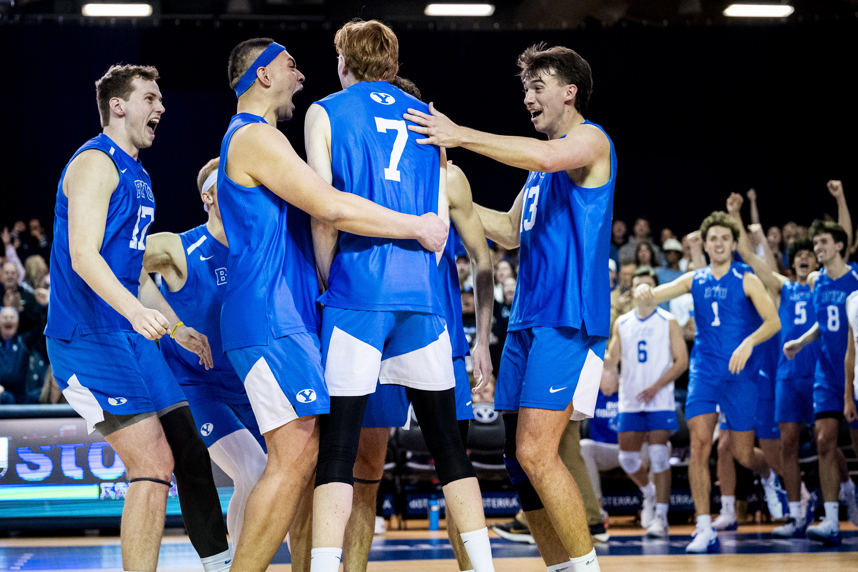 BYU players celebrate around middle blocker AJ Cottle (7) after a point against UC San Diego during an NCAA men’s volleyball game held at the George Albert Smith Fieldhouse in Provo on Friday, Jan. 16, 2026.