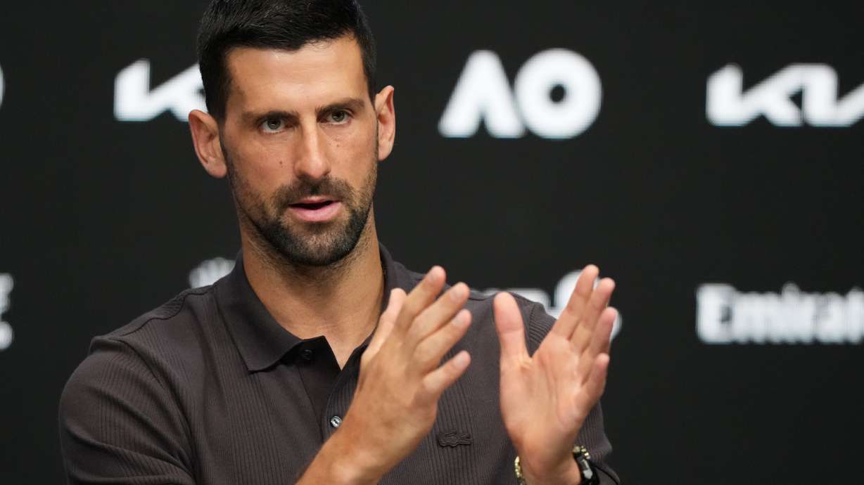 Novak Djokovic of Serbia gestures during a press conference ahead of the Australian Open tennis championship in Melbourne, Australia, Saturday, Jan. 17, 2026.