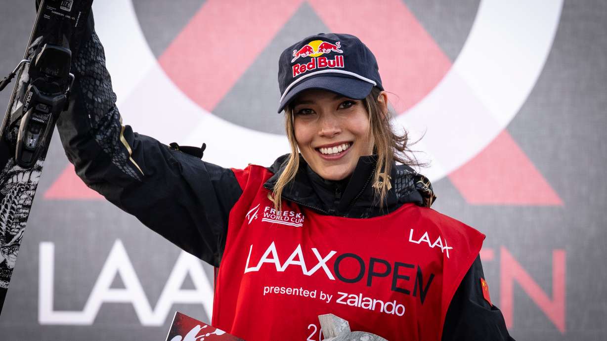 Ailing Eileen Gu of China celebrates winning the final run of the Freeski Slopestyle World Cup at Laax Open, Saturday, Jan. 17, 2026, in Laax, Switzerland.
