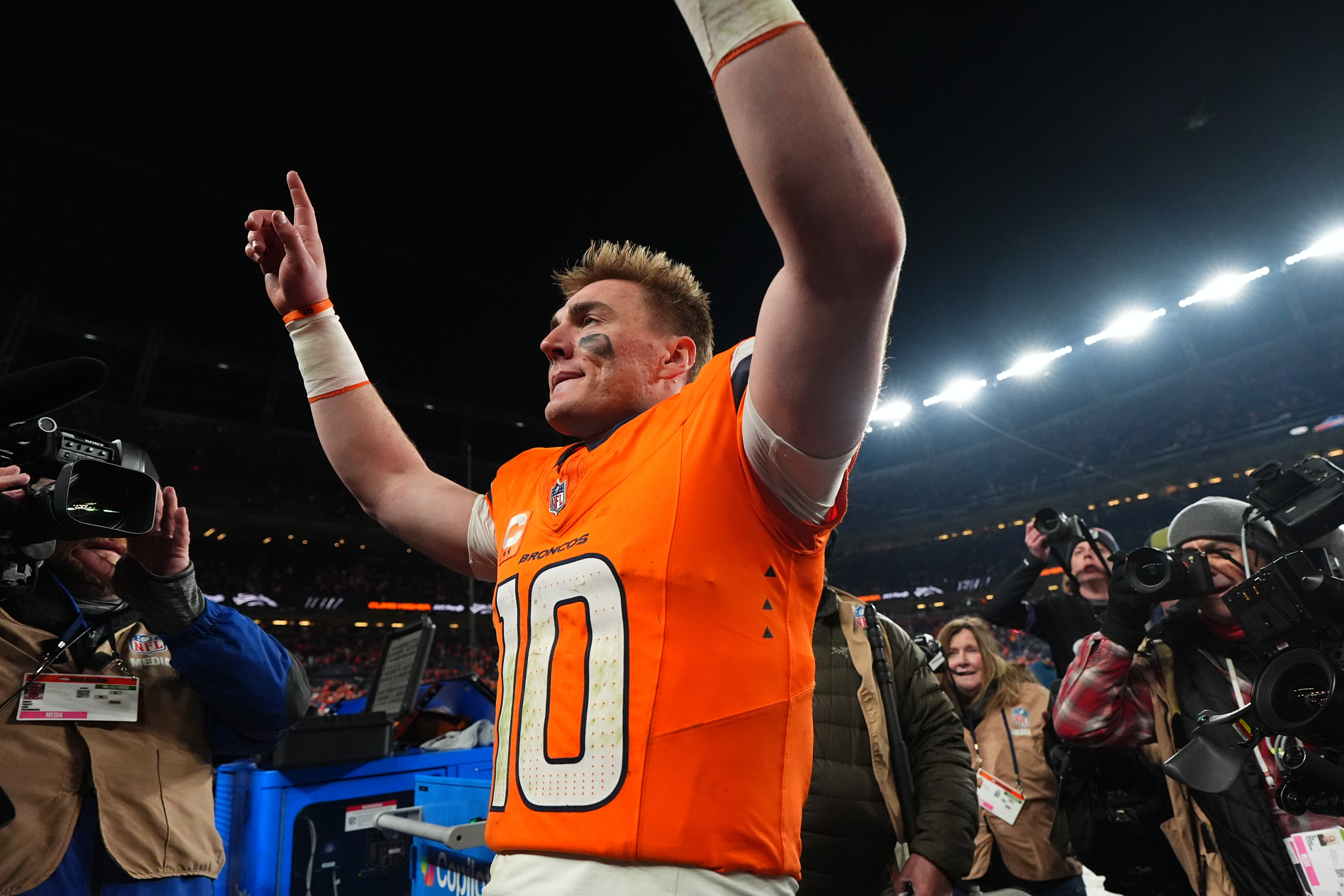 Bo Nix breaks his right ankle late in Broncos' playoff win, will have surgery