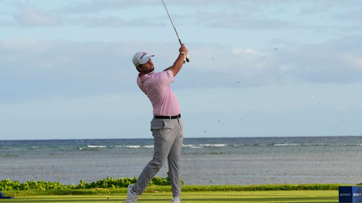 Davis Riley hits on the 17th hole during the third round of the Sony Open golf event at the Waialae Country Club in Honolulu, Saturday, Jan. 17, 2026.