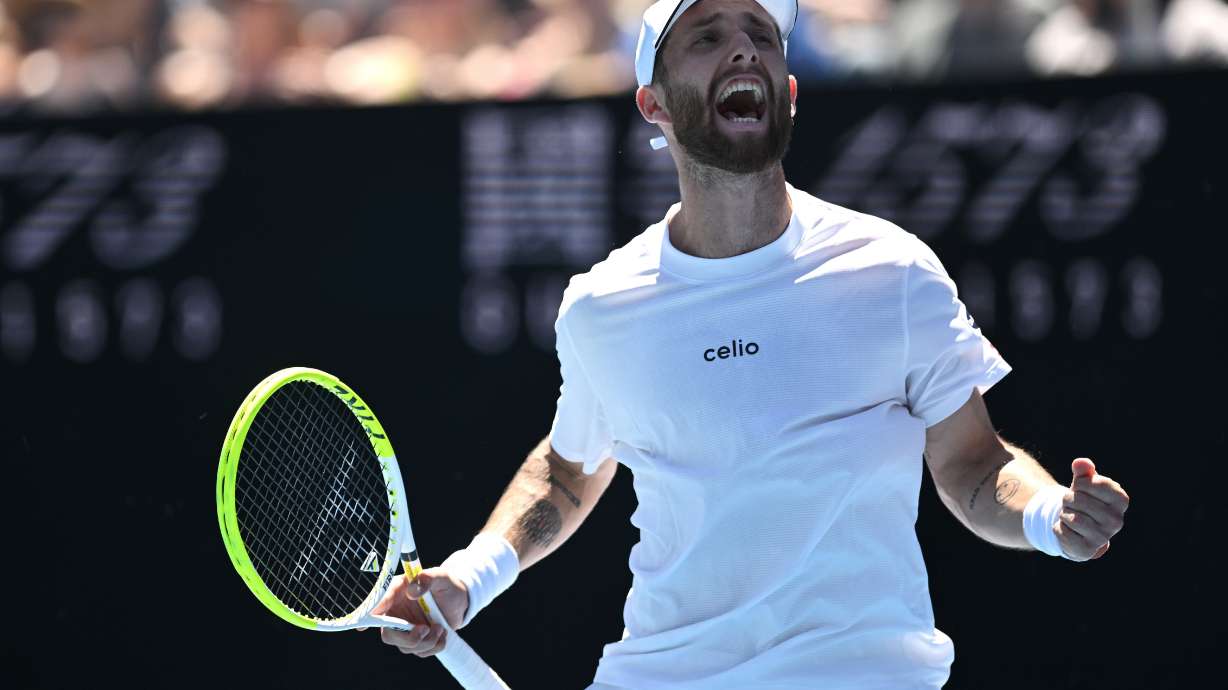 Corentin Moutet of France reacts during his first round match against Tristan Schoolkate of Australia at the Australian Open tennis championship in Melbourne, Australia, Sunday, Jan. 18, 2026.
