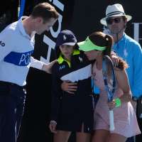 Zeynep Sönmez rushes to aid ballkid during Australian Open upset win