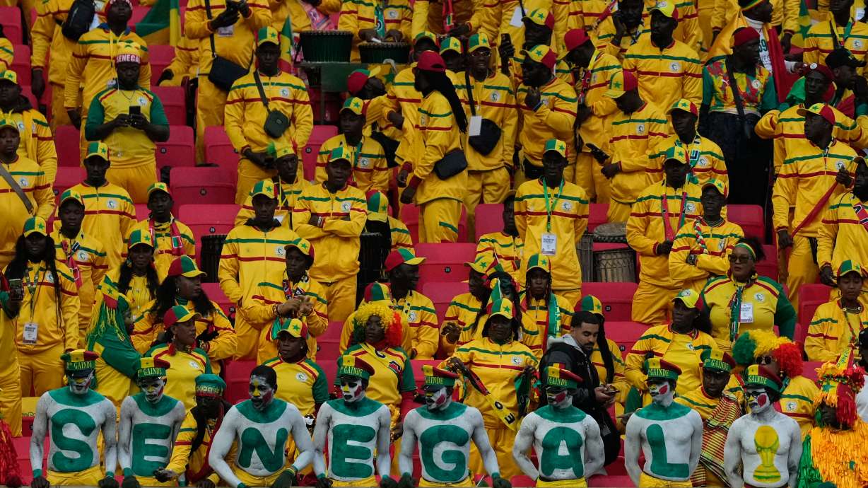 Senegal fans wait for the Africa Cup of Nations final soccer match between Senegal and Morocco, in Rabat, Morocco, Sunday, Jan. 18, 2026.