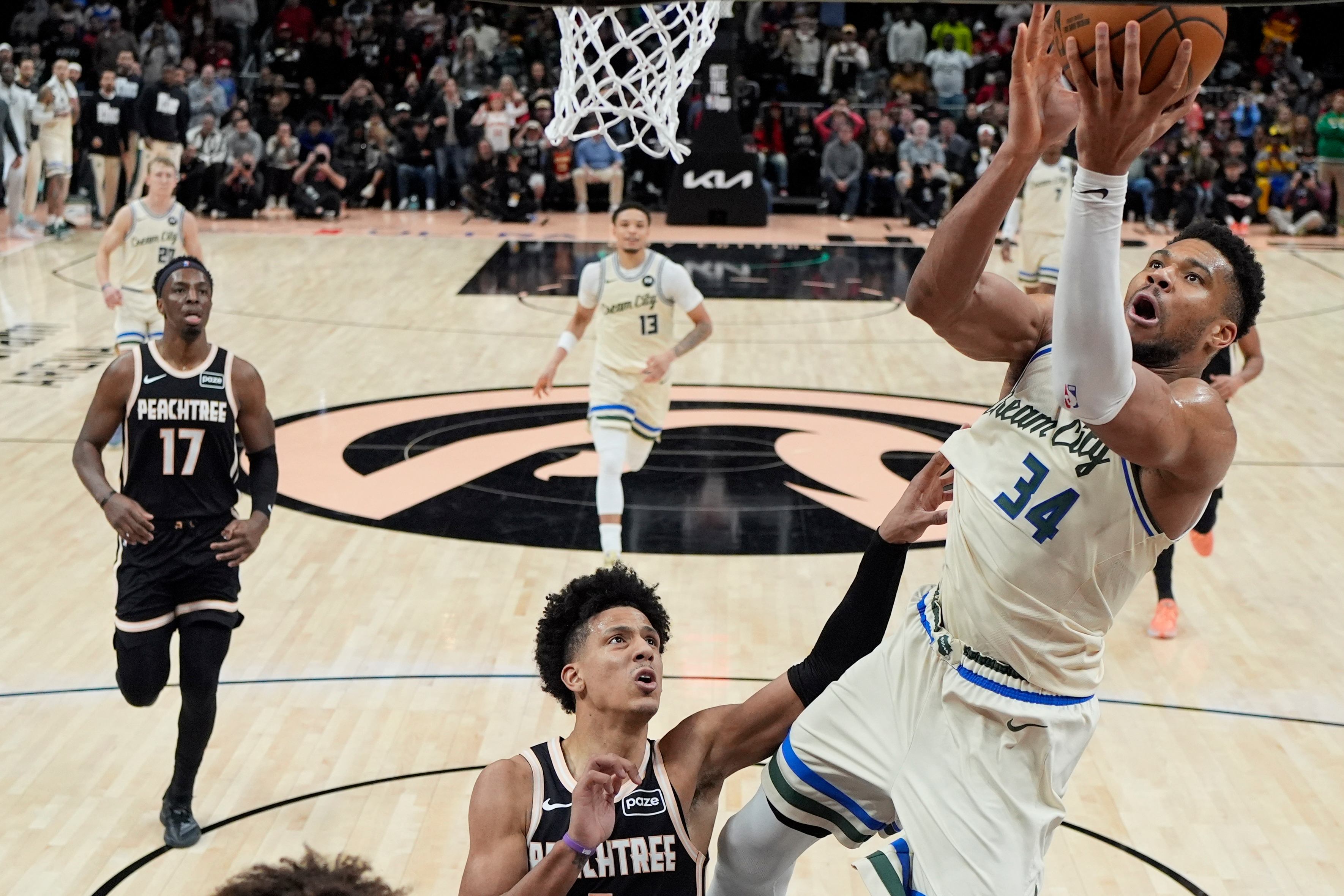 Antetokounmpo and the Bucks hold off Atlanta 112-110 to snap a three-game skid