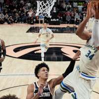 Antetokounmpo and the Bucks hold off Atlanta 112-110 to snap a three-game skid