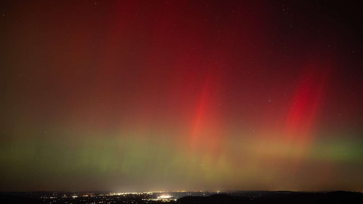 Aurora borealis, or northern lights, produced by a solar geomagnetic storm are seen from Shenandoah National Park in Rileyville, Va., in October 2024. Powerful solar activity released by the sun is heading for Earth, and it's likely to create dazzling auroral displays in unexpected areas.