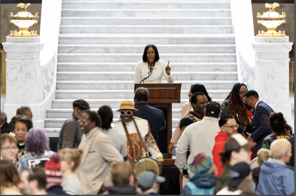 Deja Brown encourages attendees to connect with those around them at the beginning of a Martin Luther King Day Celebration hosted by Beloved Community at the Capitol in Salt Lake City on Monday.