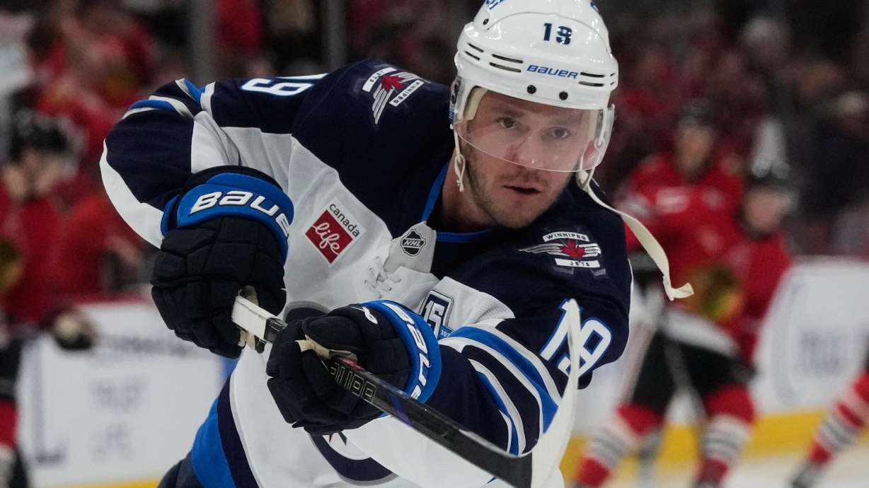 Winnipeg Jets center Jonathan Toews warms up before an NHL hockey game against the Chicago Blackhawks in Chicago, Monday, Jan. 19, 2026.