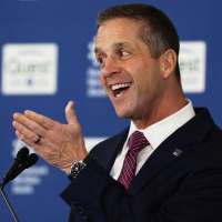 New coach John Harbaugh embraces the challenge of turning the Giants back into contenders