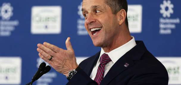 New coach John Harbaugh embraces the challenge of turning the Giants back into contenders