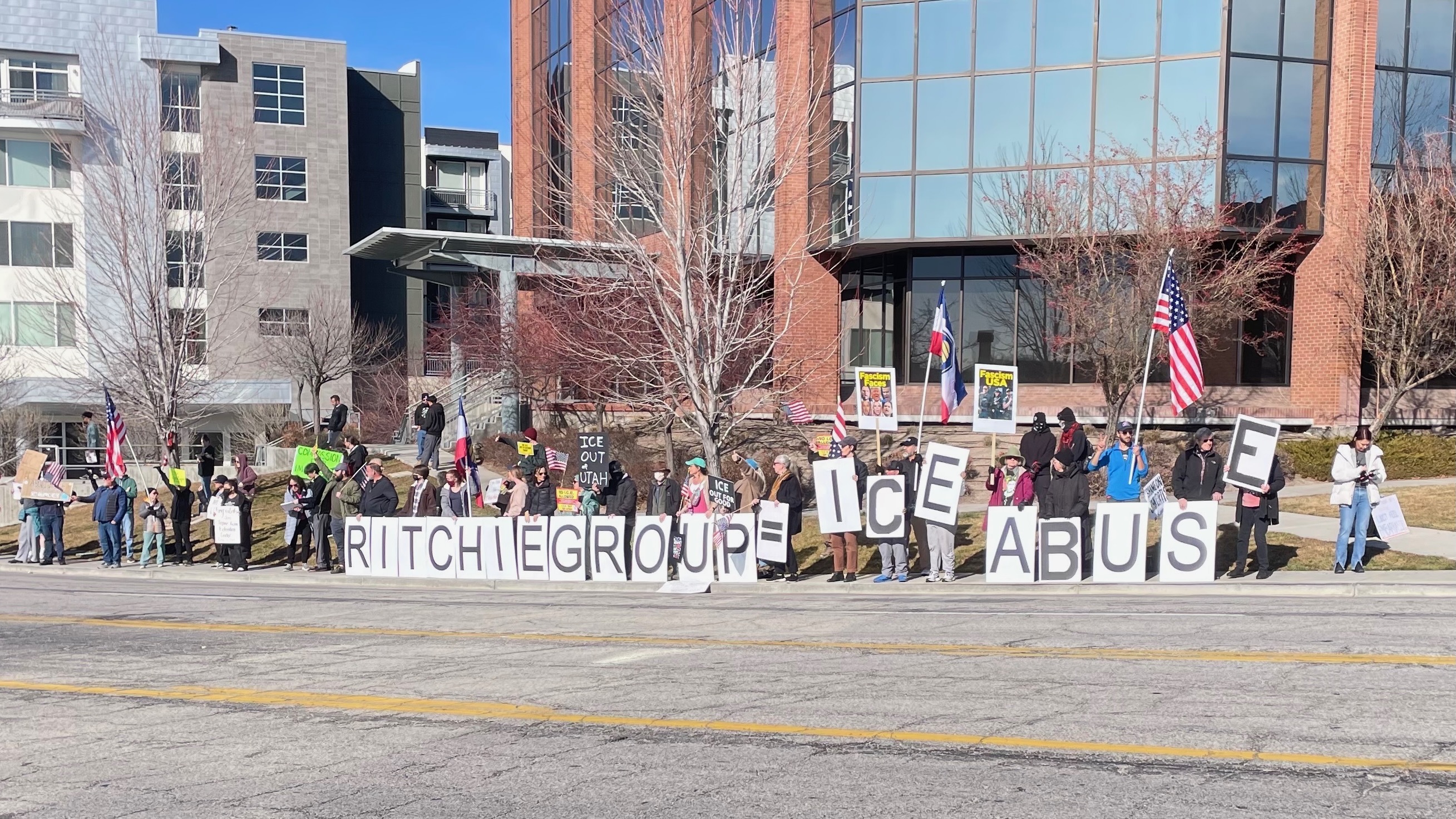 Demonstrators gather outside the offices of a developer involved in an alleged proposal to build an immigration detention center in Salt Lake City to protest the plans on Tuesday. Additional protests around the city were planned against the ongoing immigrant crackdown.