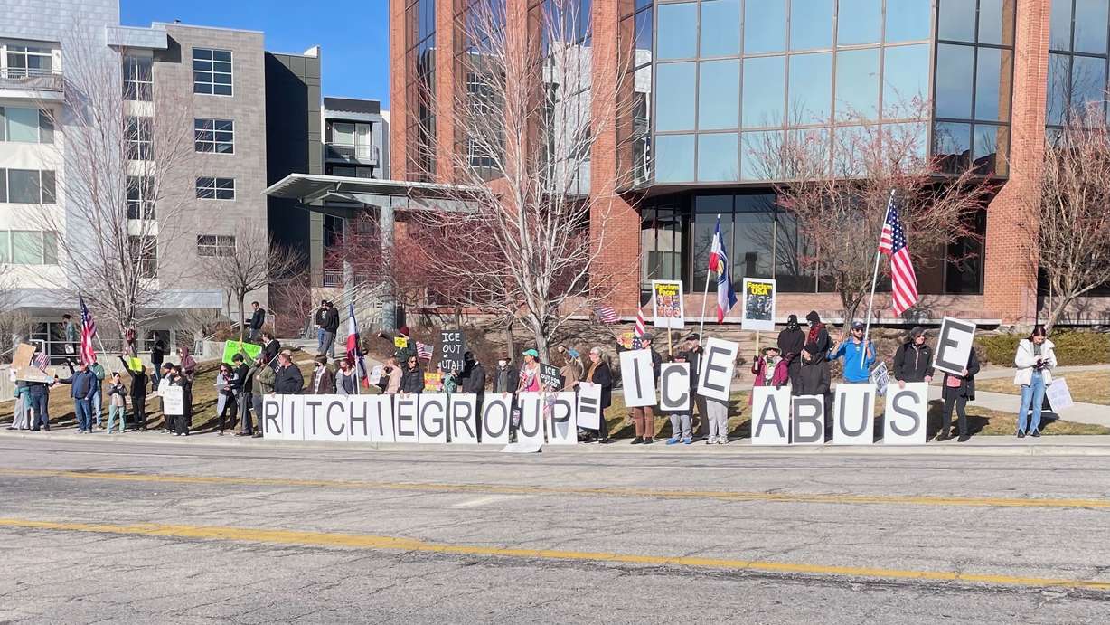 Demonstrators gather outside the offices of a developer involved in an alleged proposal to build an immigration detention center in Salt Lake City to protest the plans on Tuesday. Additional protests around the city were planned against the ongoing immigrant crackdown.