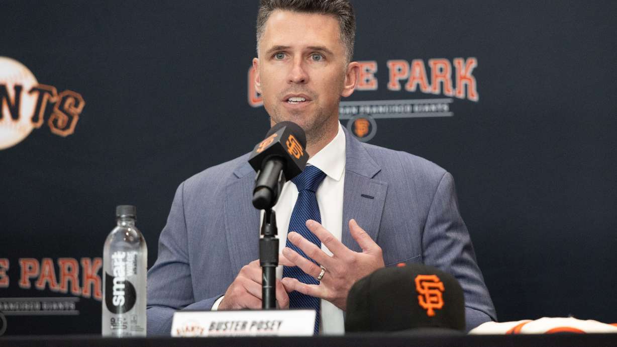 FILE -San Francisco Giants President of Baseball Operations Buster Posey sits during a press conference introducing Tony Vitello as the new manager of the San Francisco Giants baseball team on Oct. 30, 2025, in San Francisco.