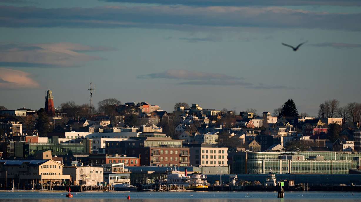 Buildings on the working waterfront catch the early morning light, Feb. 26, 2025, in Portland, Maine. The state is focus of a new federal immigration crackdown campaign.
