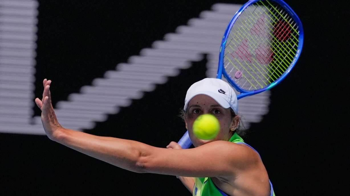 Madison Keys of the U.S. plays a forehand return to compatriot Ashlyn Krueger during their second round match at the Australian Open tennis championship in Melbourne, Australia, Thursday, Jan. 22, 2026.