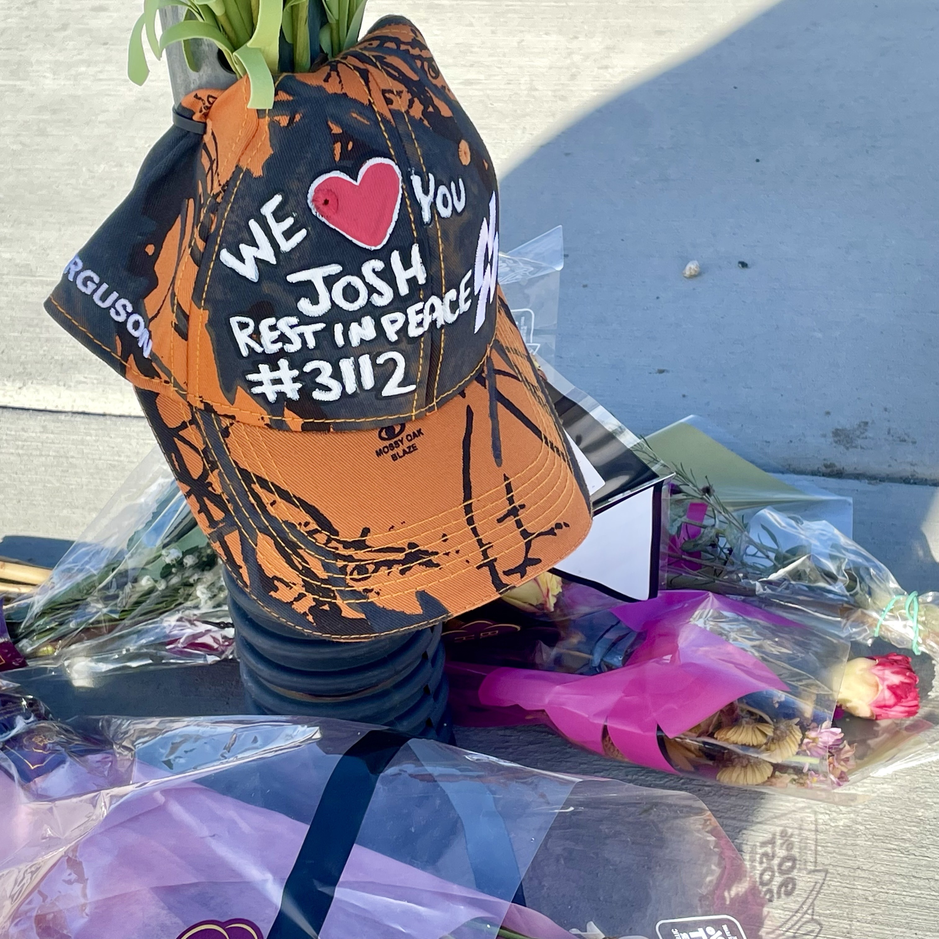 A memorial for Joshua Perry at the intersection of 11000 South 1000 East on Wednesday. Community members are calling for safety measures after Perry was hit and killed at the intersection by an alleged drunk driver on Jan. 15.