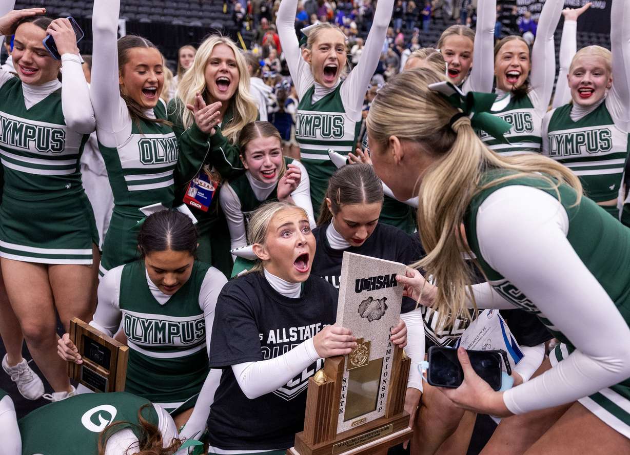 Olympus celebrates its 5A state championship title at the UCCU Event Center in Orem on Wednesday, Jan. 21, 2026.