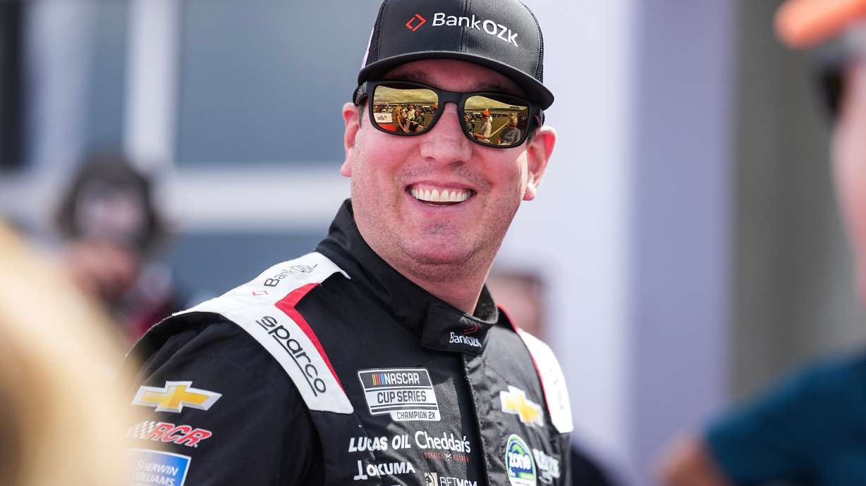 FILE - Kyle Busch smiles prior to a NASCAR Cup Series auto race at Charlotte Motor Speedway, Sunday, Oct. 5, 2025, in Concord, N.C.