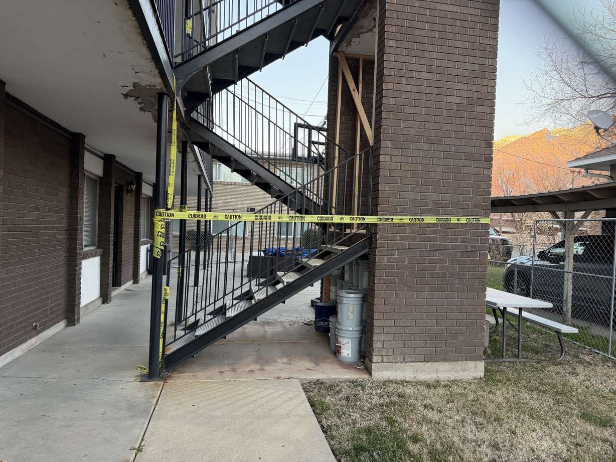 A damaged stairwell at Brookview Apartments in Provo is fenced off due to instability on Jan. 15. Tenants were forced to move in November, but no work has been completed on the stairs since.