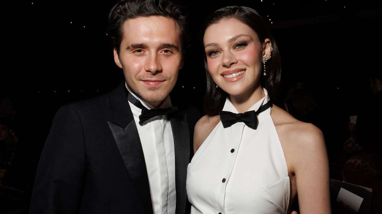 Brooklyn Beckham and Nicola Peltz attend the Victoria Beckham Spring/Summer 2025 collection presented in Paris in September 2024.