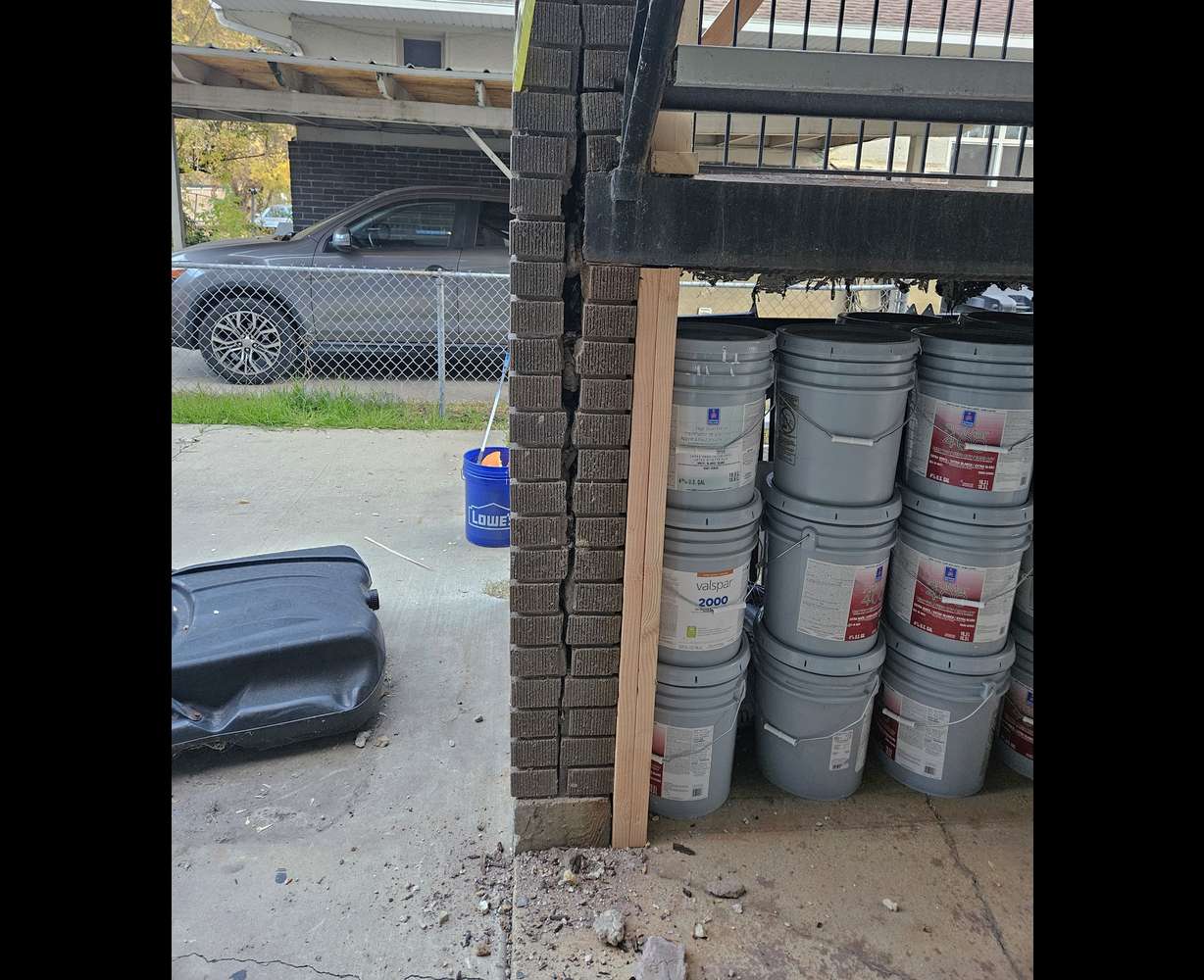 A Brookview Apartment stairwell with cracked bricks is blocked off after tenants were forced to move out suddenly in November 2025.