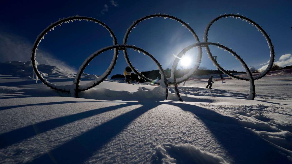 FILE - Olympic rings are displayed in the snow at the Stelvio Ski Center, venue for the alpine ski and ski mountaineering disciplines at the 2026 Milan Cortina Winter Olympics in Bormio, Italy, Jan. 16, 2025.