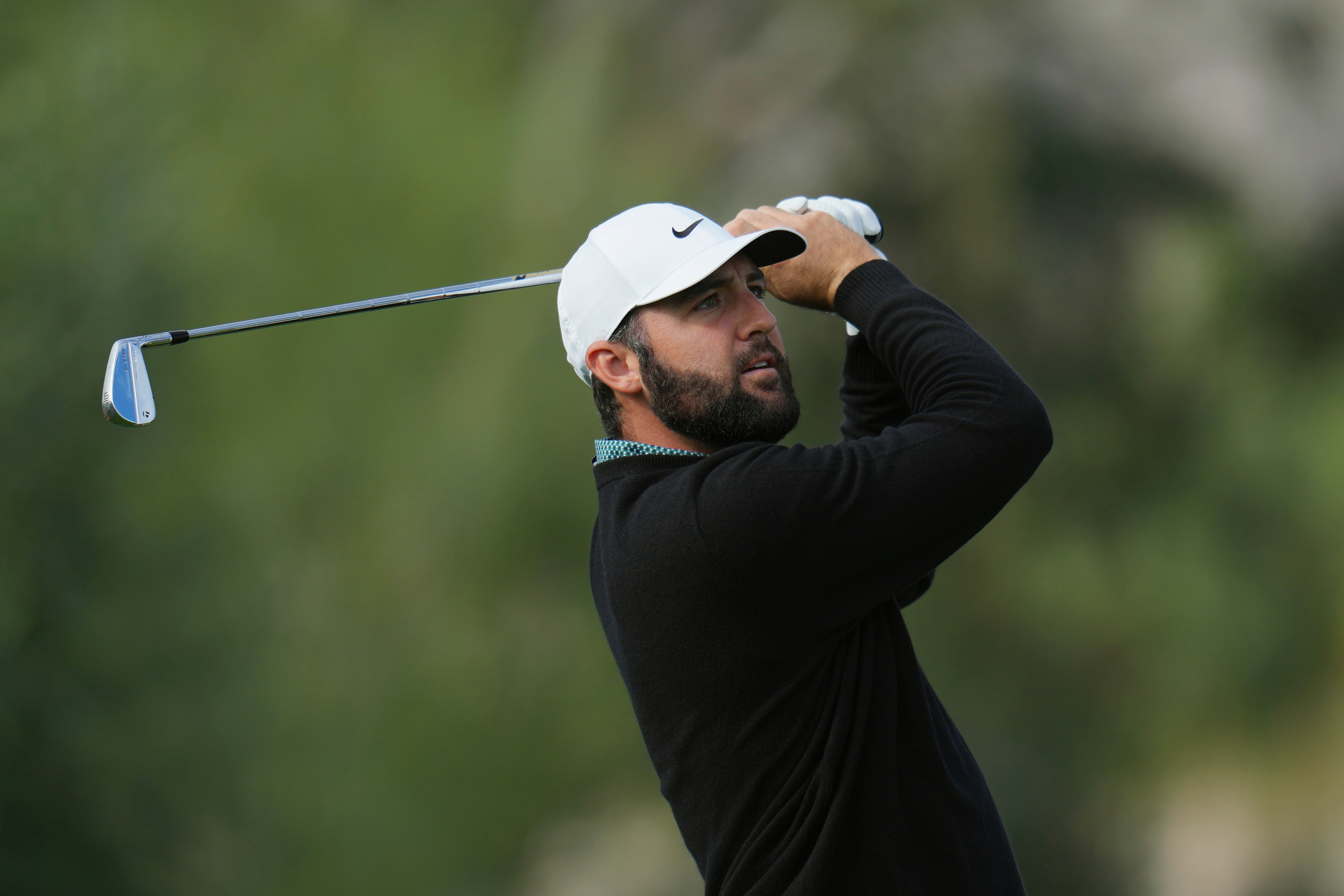 Scottie Scheffler watches his shot from the third tee during the first round of the American Express golf event at La Quinta County Club Thursday, Jan. 22, 2026, in La Quinta, Calif. 