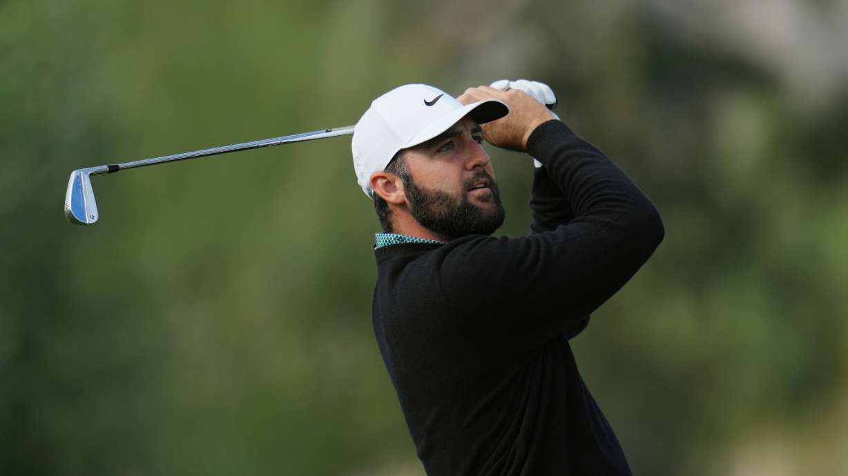 Scottie Scheffler watches his shot from the third tee during the first round of the American Express golf event at La Quinta County Club Thursday, Jan. 22, 2026, in La Quinta, Calif.