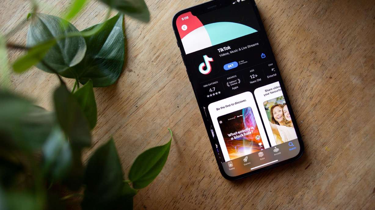 TikTok is seen in the app store of an iPhone on Jan. 8. A deal to secure TikTok's future in the U.S. has been reached.