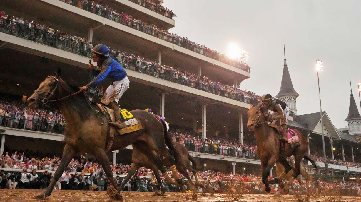 FILE - Sovereignty, ridden by Junior Alvarado, left, crosses the finish line to win the 151st running of the Kentucky Derby horse race followed by Journalism, ridden by Umberto Rispoli, May 3, 2025, at Churchill Downs in Louisville, Ky.